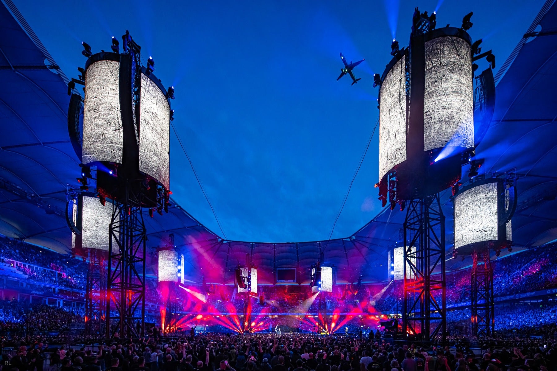 Red and blue lighting filling Metallica's M72 stadium stage